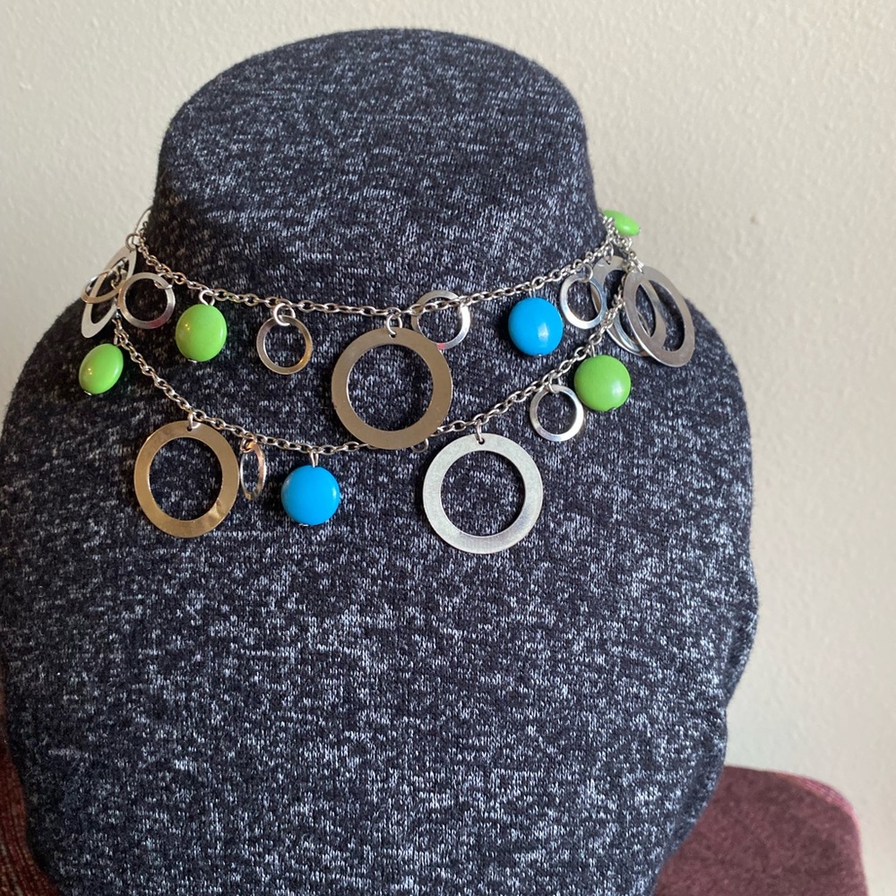 SILVERTONE NECKLACE with hanging circles, along w/turquoise and green beads.